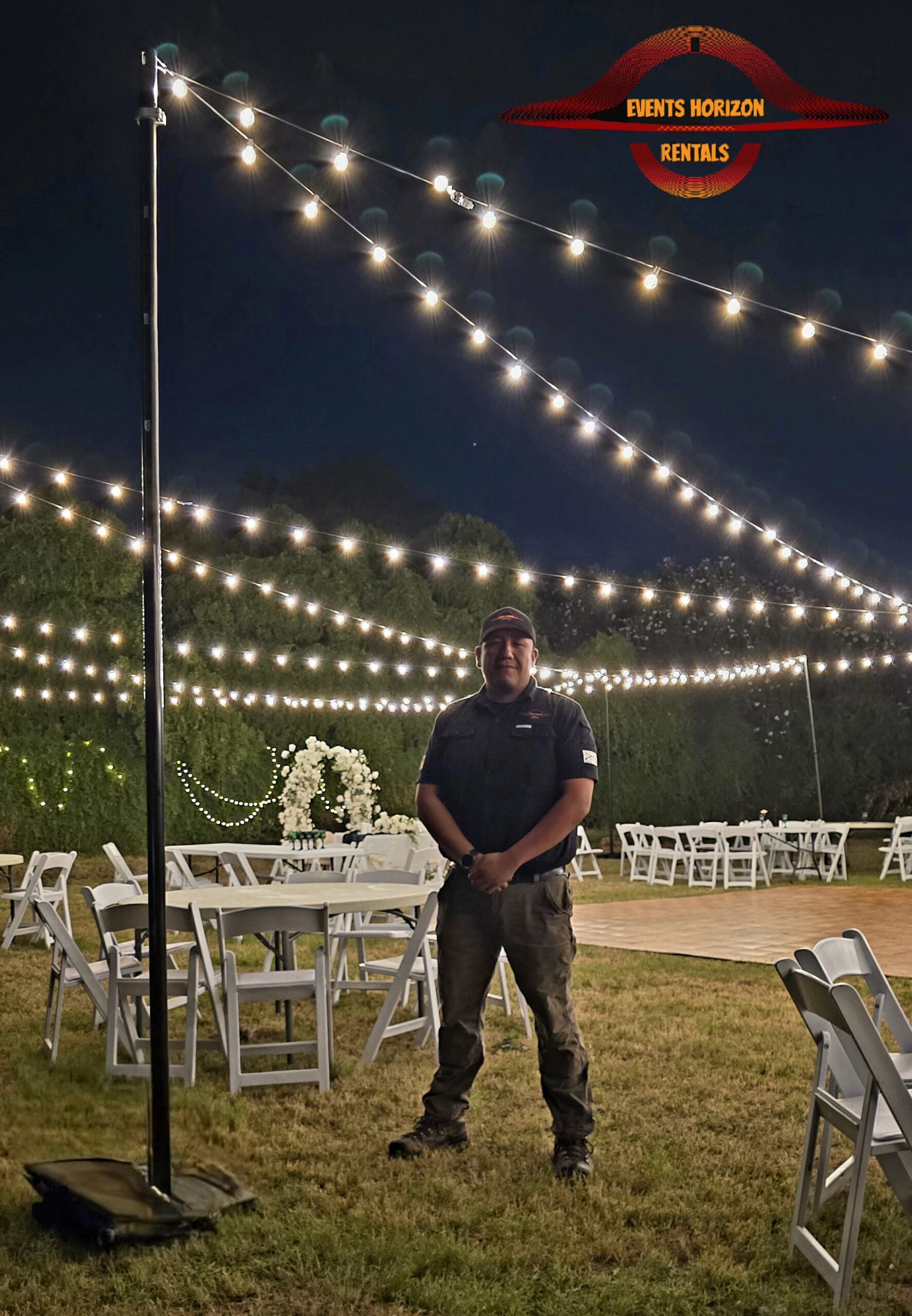 Sergio Valenzuela of Events Horizon Rentals at an outdoor bistro string lighting installation in Arizona